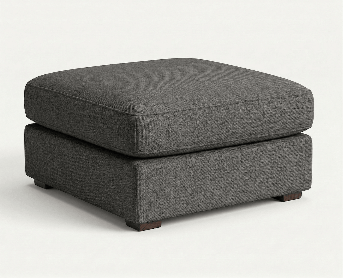 Alloy gray modular sectional ottoman on a white background.